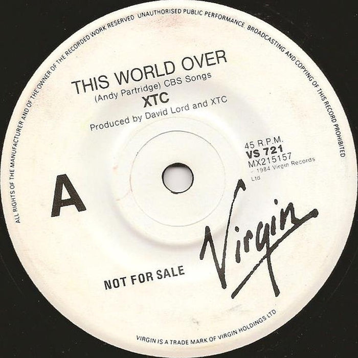 XTC – This World Over (VG+/VG+)