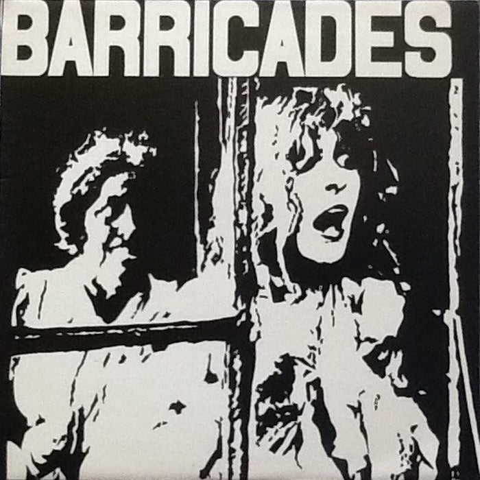 Woll – Barricades (NM/VG+)
