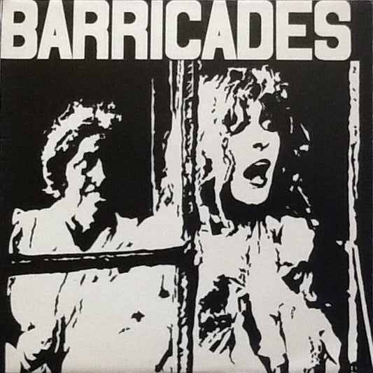 Woll – Barricades (NM/VG+)
